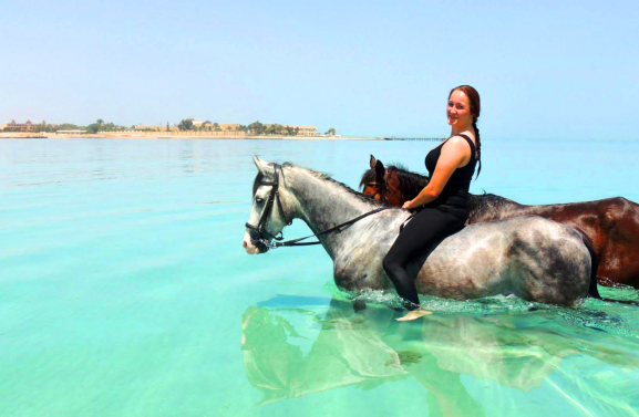 girl2horsesswimming-1600x900